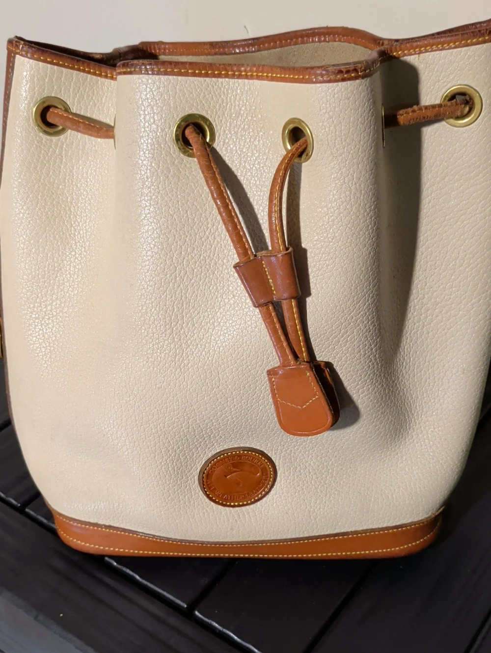 Dooney & Bourke Cream and Brown Drawstring Bucket Bag